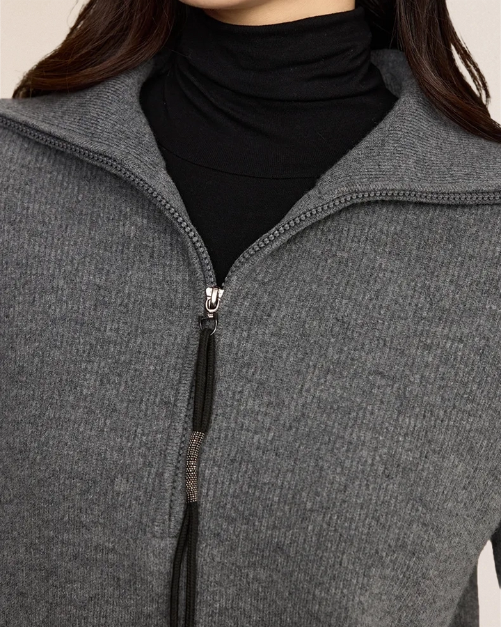 VIONIS·XY 100% Merino Wool half-zip sweater in Heather Grey, close-up of silver-tone zipper and premium knit texture