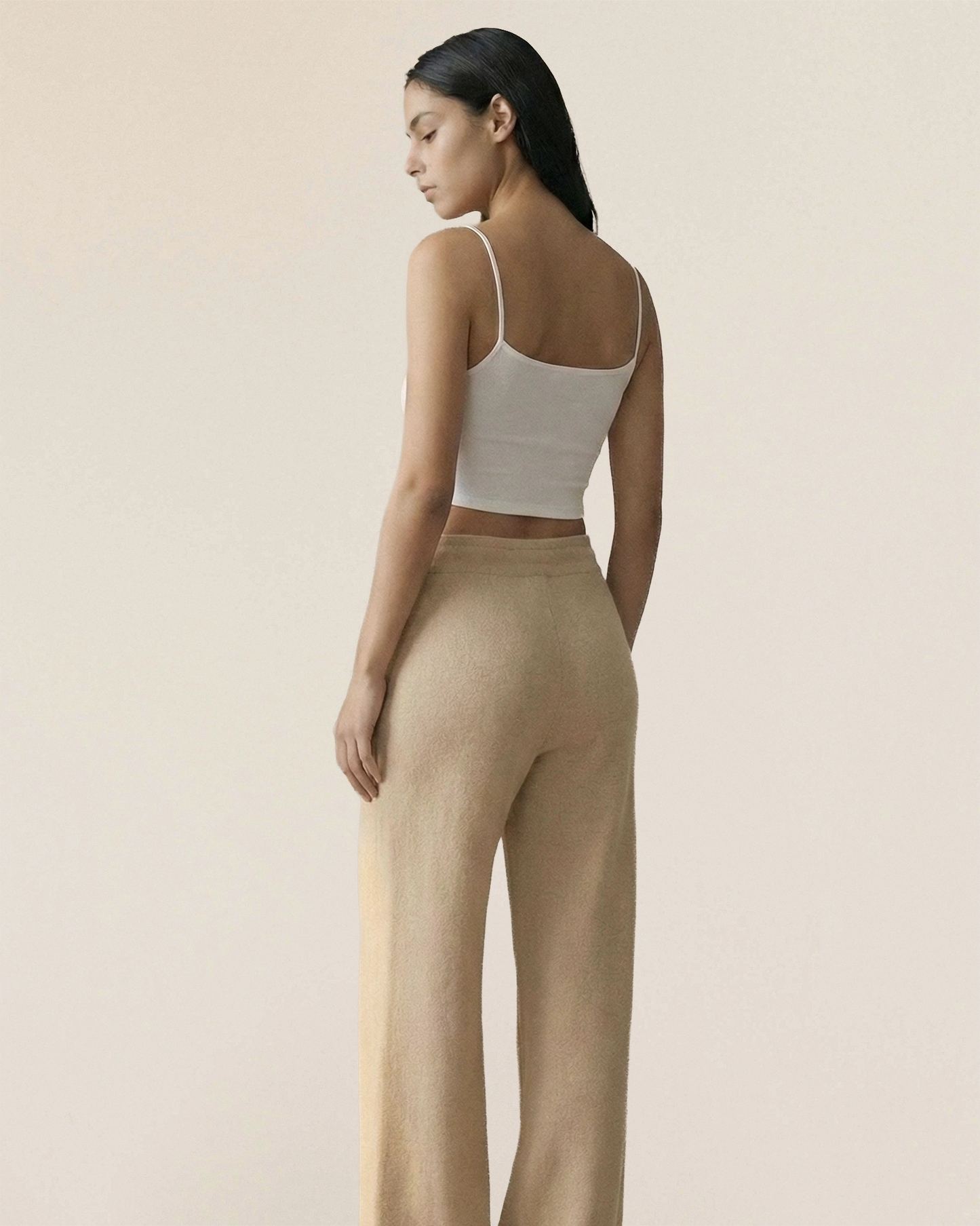 Vionis·XY back view of ecru Inner Mongolia cashmere trousers, relaxed fit with minimal deformation after wear