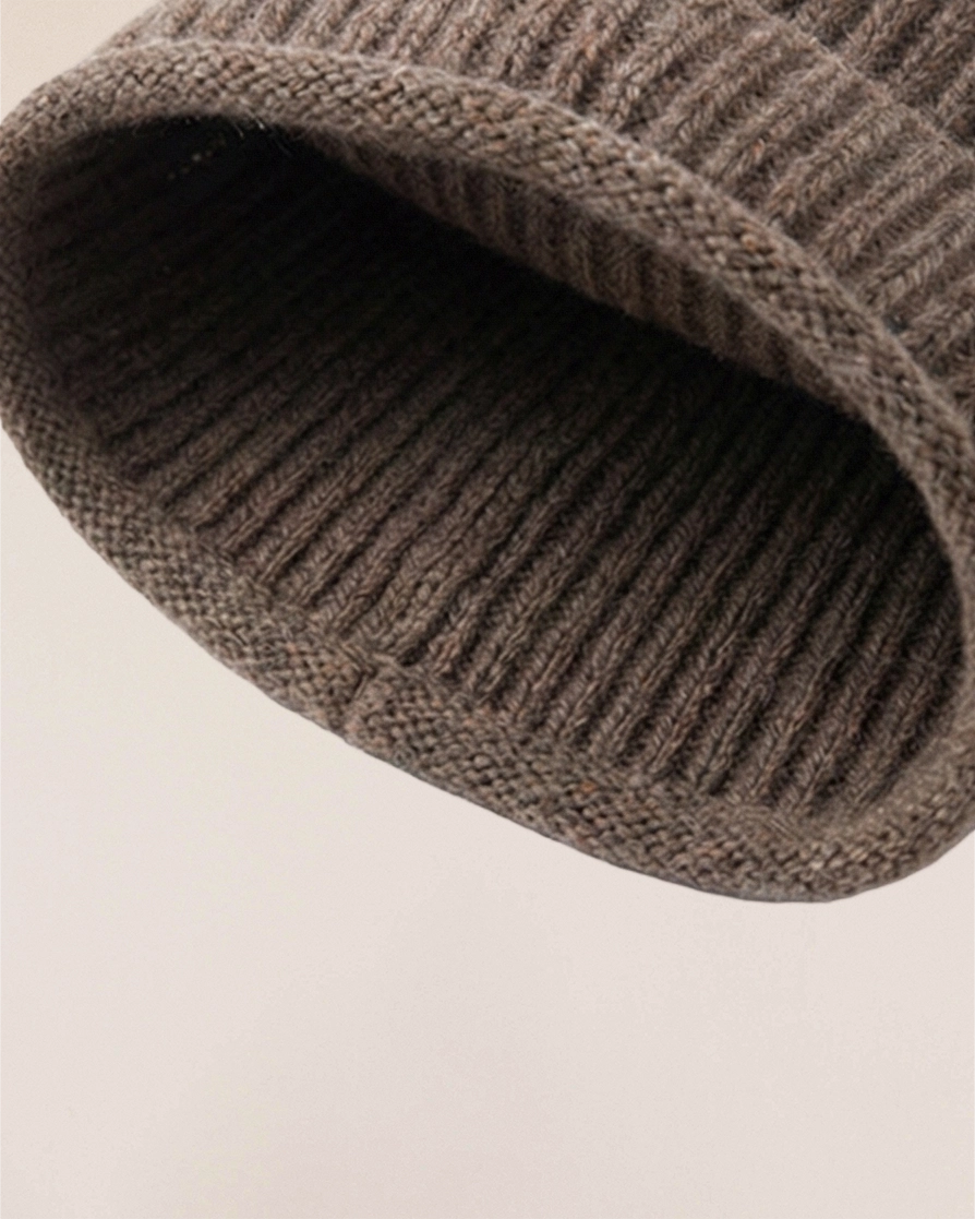 Detail of VIONIS·XY cocoa merino tie-bonnet interior, skin-friendly merino wool designed for zero itch cocoa