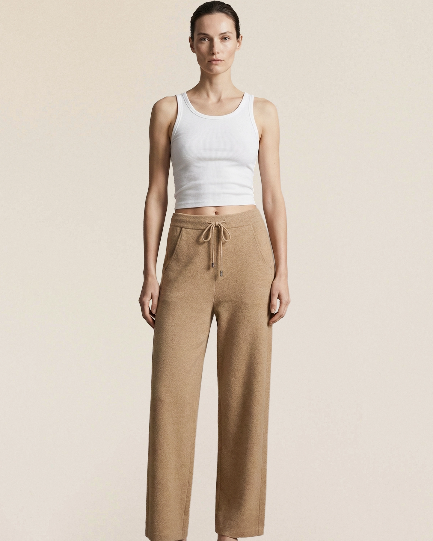 Vionis·XY side view of oatmeal cashmere wide-leg trousers, dense 510g knit providing full opacity and sculptural drape