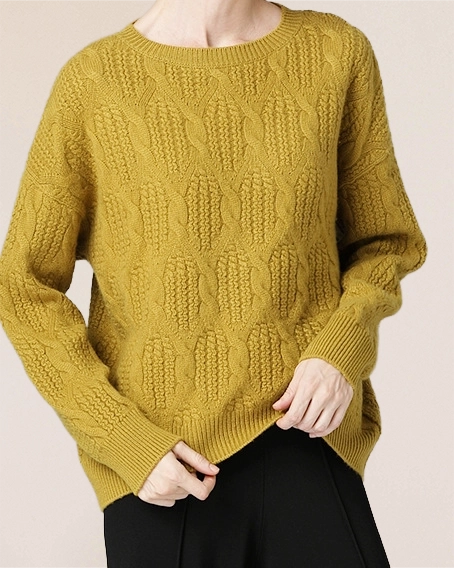 Close-up of VIONIS·XY spiced ochre cable knit pattern, 500g Inner Mongolia cashmere with braided texture