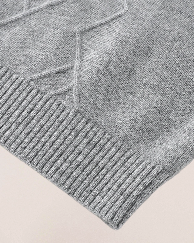 Macro view of VIONIS·XY heather grey cashmere fabric, soft Grade-A fibers with architectural depth